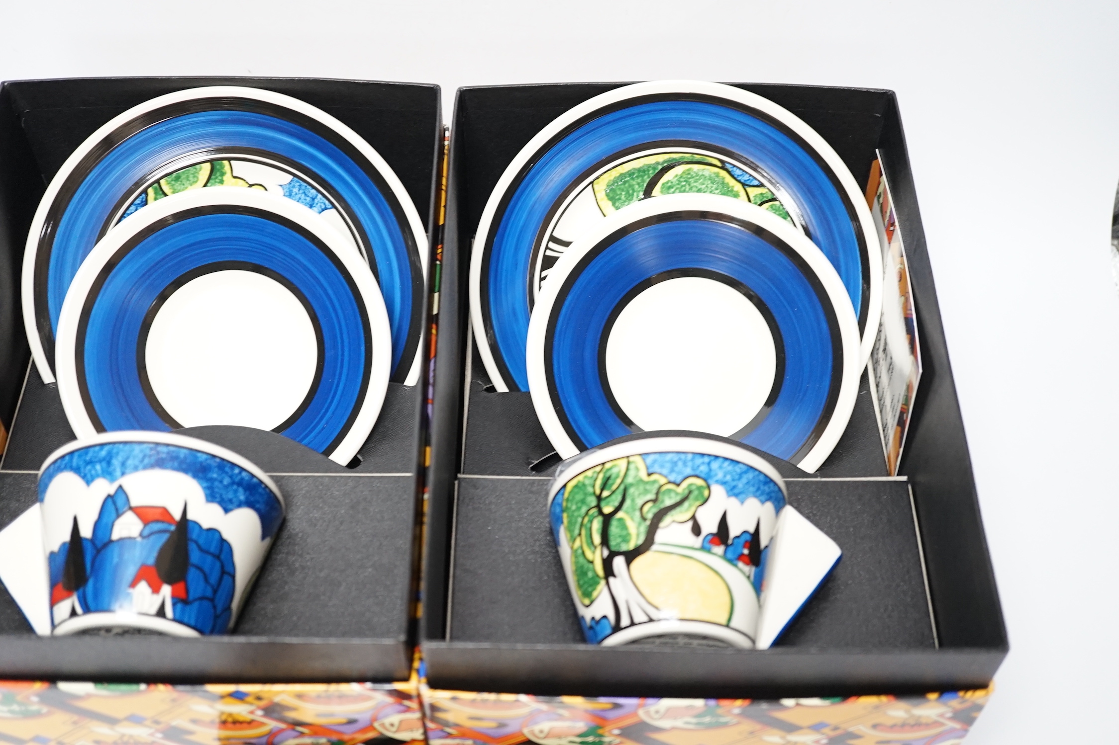 Two Wedgwood Clarice Cliff limited edition May Avenue trios together with a carpet conical sugar, each with boxes and certificates